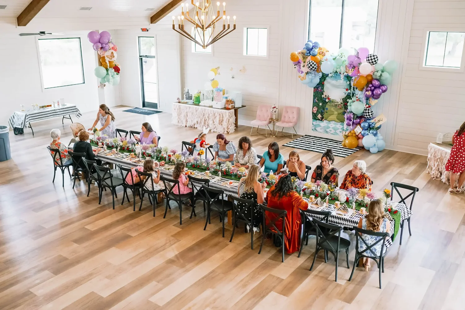 Indoor celebration with a long decorated table